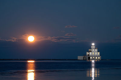 Scenic view of sea against sky at night