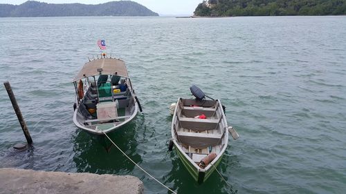 High angle view of boat moored on sea