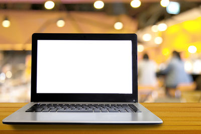 Close-up of laptop on table