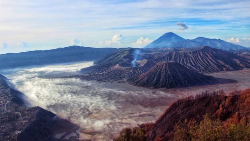 Panoramic view of volcanic landscape against sky