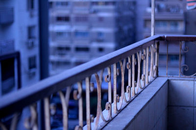 Close-up of railing in building