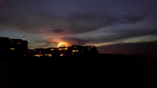 View of illuminated city at night