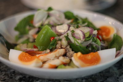 Close-up of salad served in plate on table