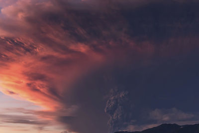 Low angle view of dramatic sky during sunset