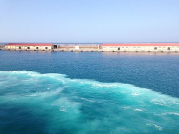 Scenic view of sea against clear blue sky