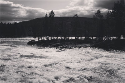 Scenic view of river against sky