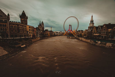 River passing through city buildings