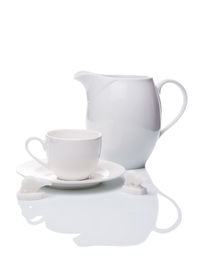 Close-up of coffee cup against white background