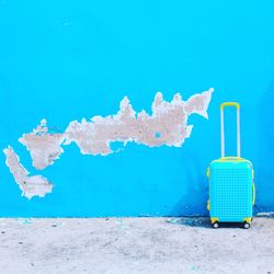 Close-up of blue beach against sky