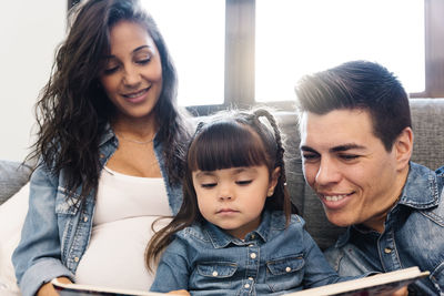 Portrait of smiling father with daughter