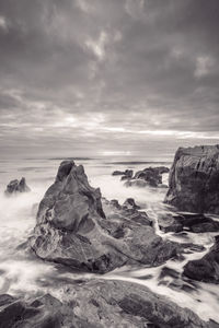 Sunset at the rocky beach at vila nova de gaia, portugal.	