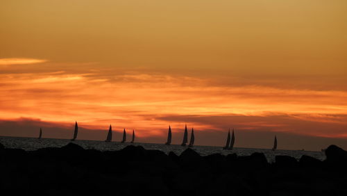 Scenic view of sea at sunset