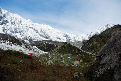 Scenic view of snowcapped mountains against sky