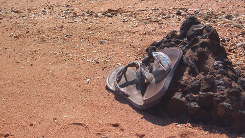 High angle view of woman lying on sand