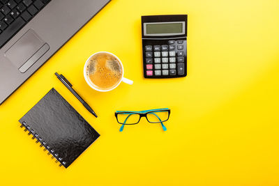 High angle view of coffee cup on table