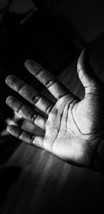 Close-up of hands playing piano