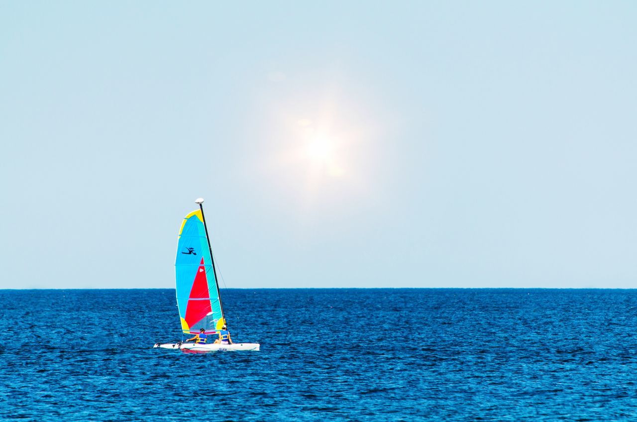 sea, horizon over water, water, waterfront, clear sky, tranquility, tranquil scene, scenics, blue, rippled, copy space, beauty in nature, leisure activity, nature, lifestyles, idyllic, sky, nautical vessel