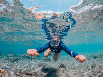 Man swimming in sea