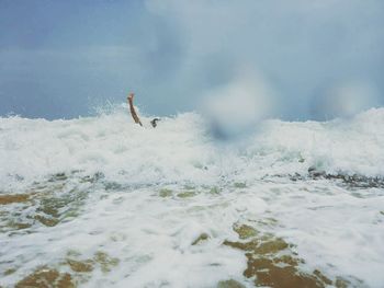 Waves splashing on rocks