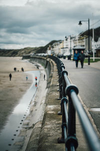 Sea railings leading off into the distance 