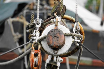 Close-up of ropes on metal pulley