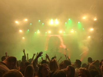 Crowd at music concert at night