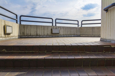 Empty staircase against building in city