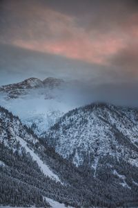 Scenic view of snow covered landscape against sky