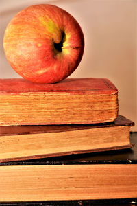 Close-up of apple on wooden table