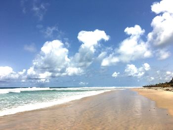 Scenic view of sea against cloudy sky