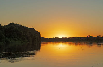 Sunset on the rio san lorenco river near porto jofre in the pantanal in brazil
