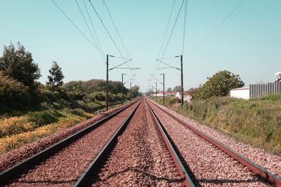 Railroad tracks against sky