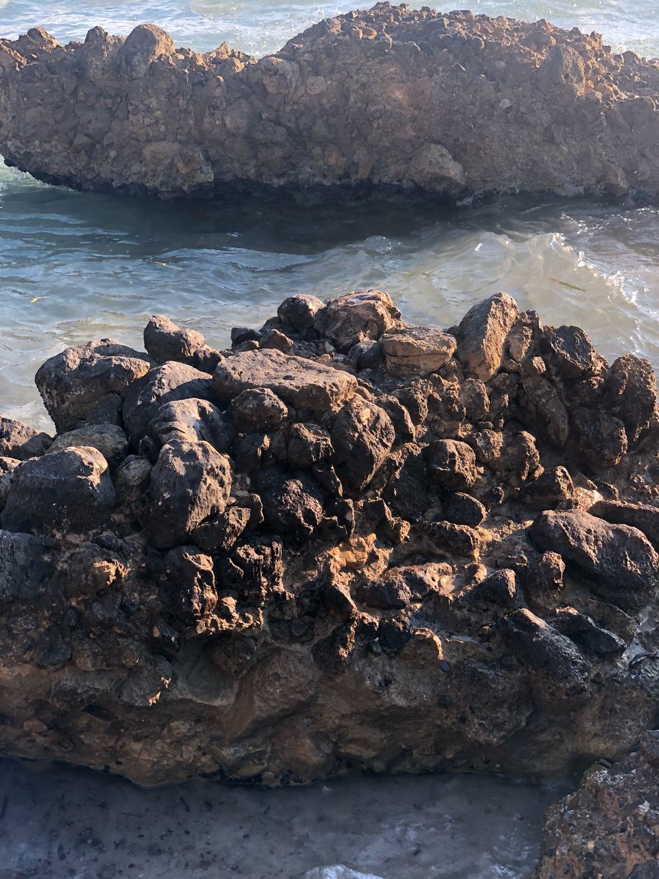 SCENIC VIEW OF ROCKS ON BEACH