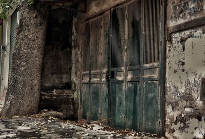 Closed door of old abandoned building