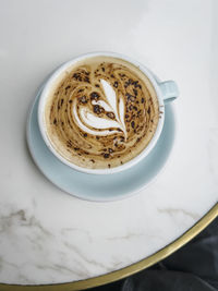 High angle view of coffee on table