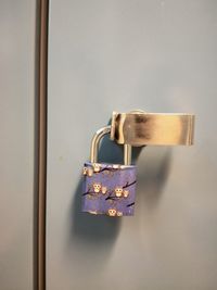 Close-up of padlock on locker