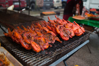 Close-up of meat on barbecue grill