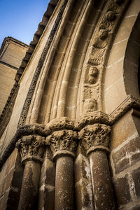 Low angle view of statue against building