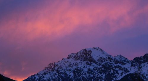 Scenic view of mountains against sky during sunset