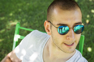 Portrait of young man wearing sunglasses