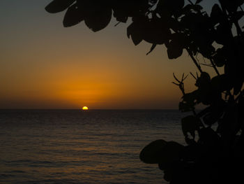 Scenic view of sea at sunset