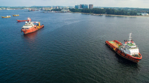 High angle view of ship sailing in sea