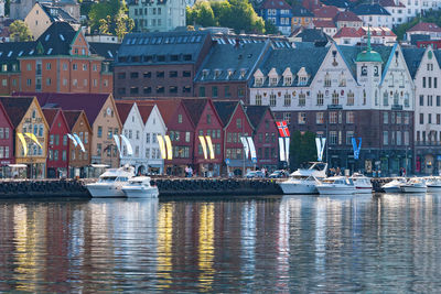 Boats moored at harbor
