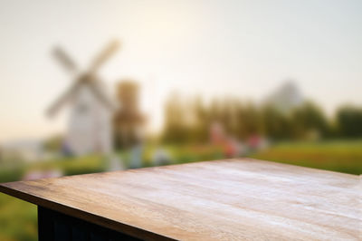 Close-up of toy on field against sky