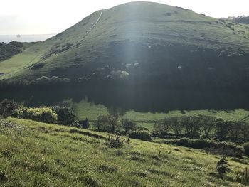 Scenic view of land against sky