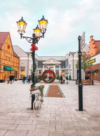 Street light on city street during christmas