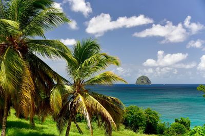 Scenic view of sea against cloudy sky