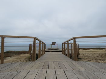 Wooden jetty leading to the sea