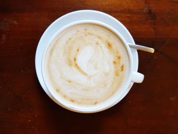 High angle view of cappuccino on table