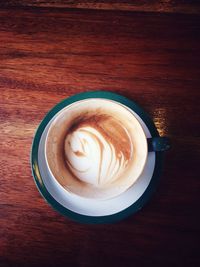 High angle view of cappuccino on table